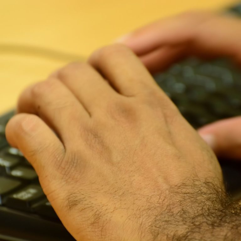 man typing